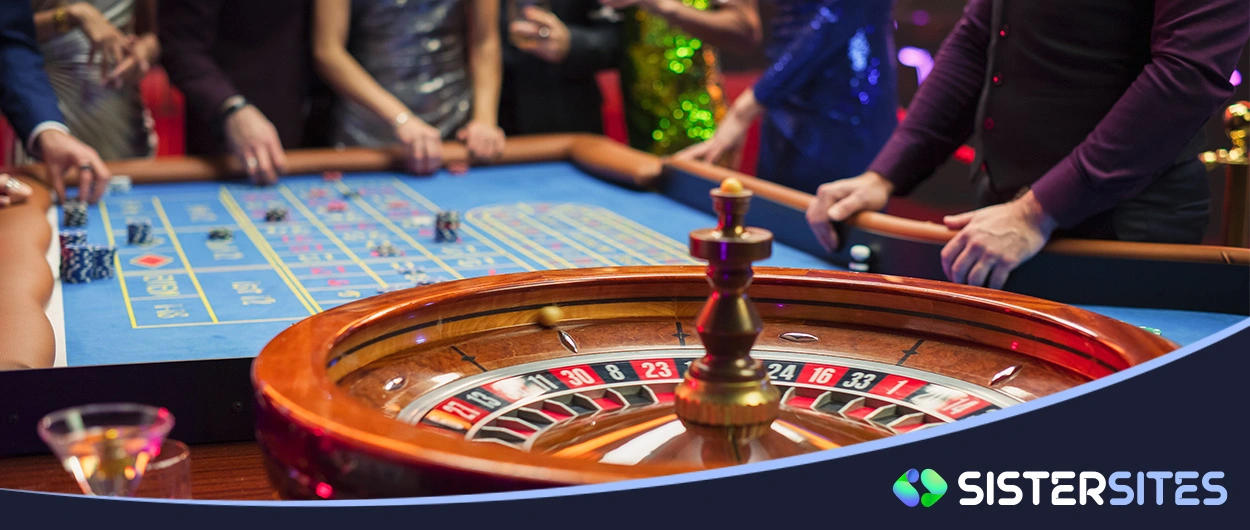 A roulette table with Sister Sites logo